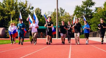 В Мелитополе провели патриотический забег ко Дню Государственного флага России